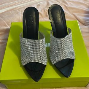 Silver embellished New Years Day pumps with 4 1/2 inch heels